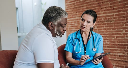 man talking to his doctor