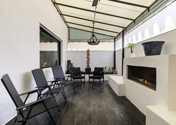 Modern outdoor patio with fireplace