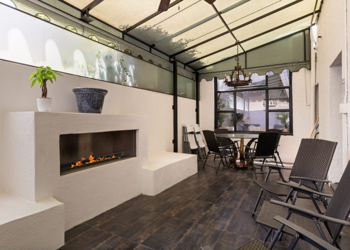 Comfortable area with modern fireplace
